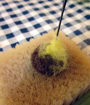 spot on needle felted beads